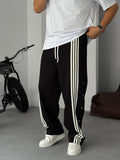 Striped Sweatpants with Button Details