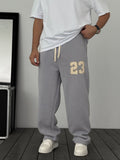 23 Patched Washed Fleece-Lined Sweatpants