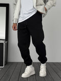 Fleece-Lined Sweatpants with Elastic Hem